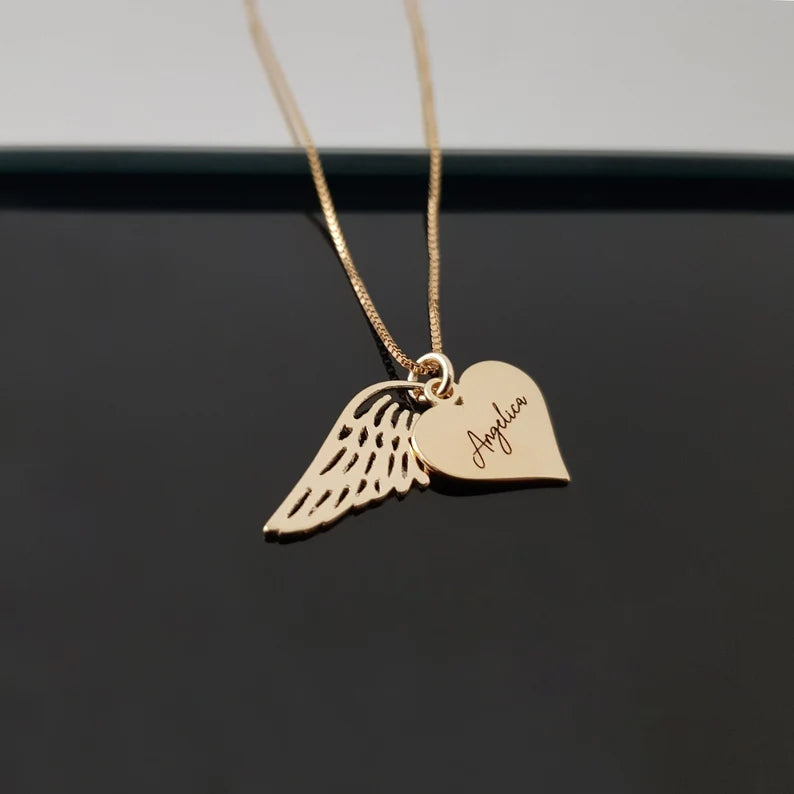 Set de regalo de collar corazón con alas de ángel